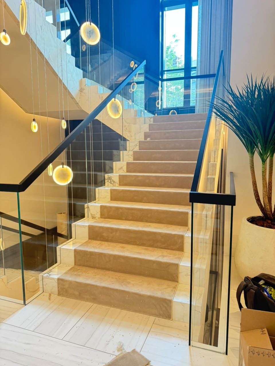 THE RUGS customized stairs carpet installation at Dubai Hills Estate