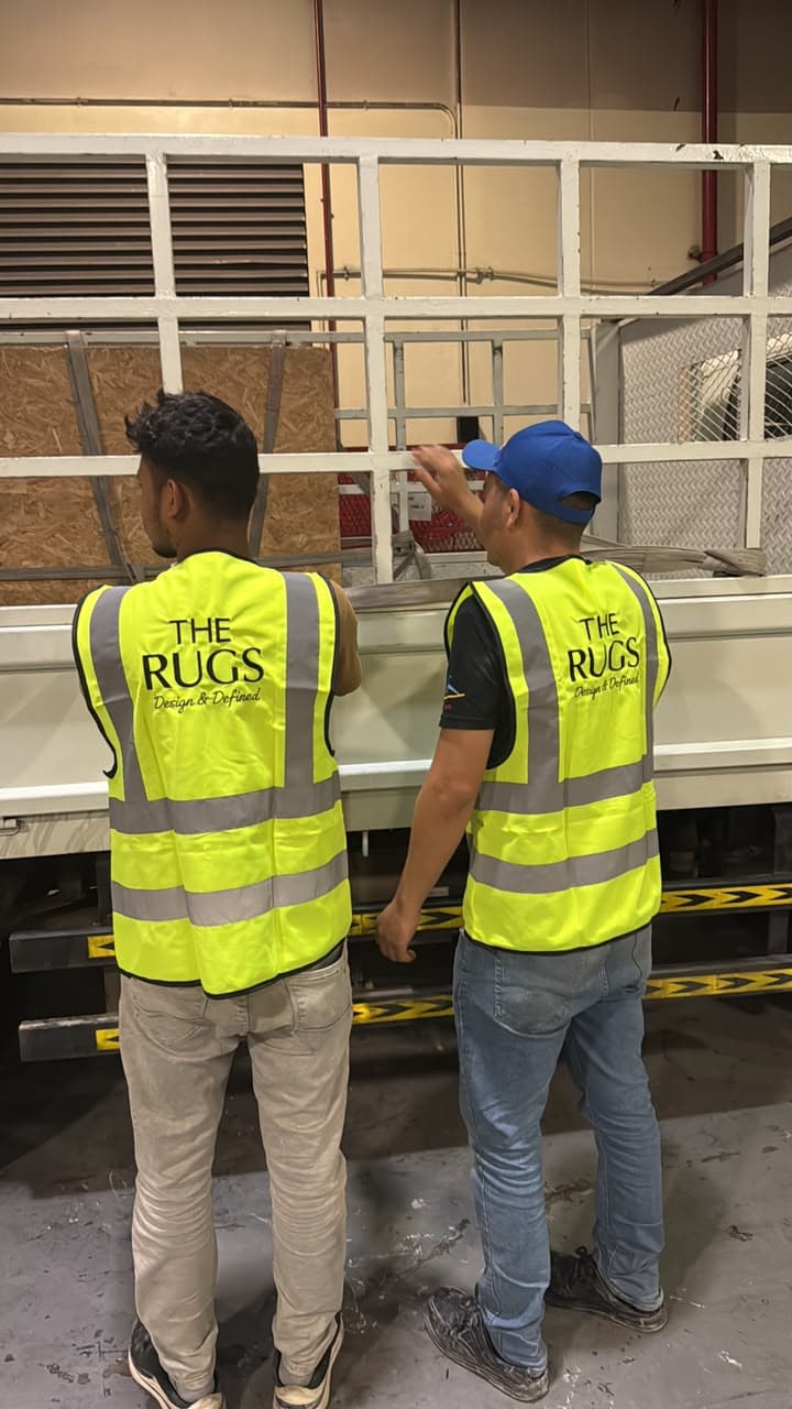 THE RUGS team installing carpet at Kempinski Dubai Mall