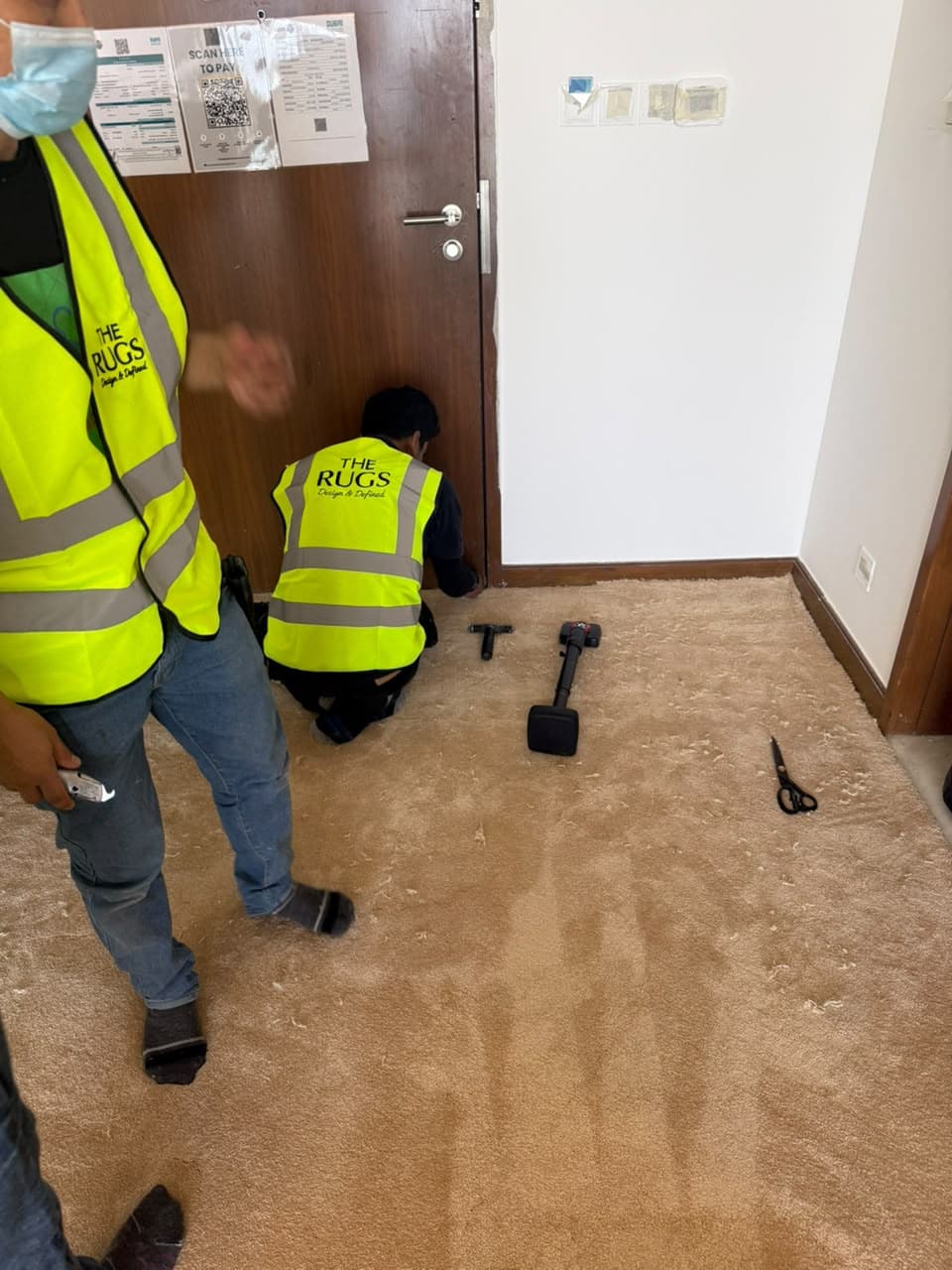THE RUGS carpet installation work in progress at Kempinski Dubai Mall