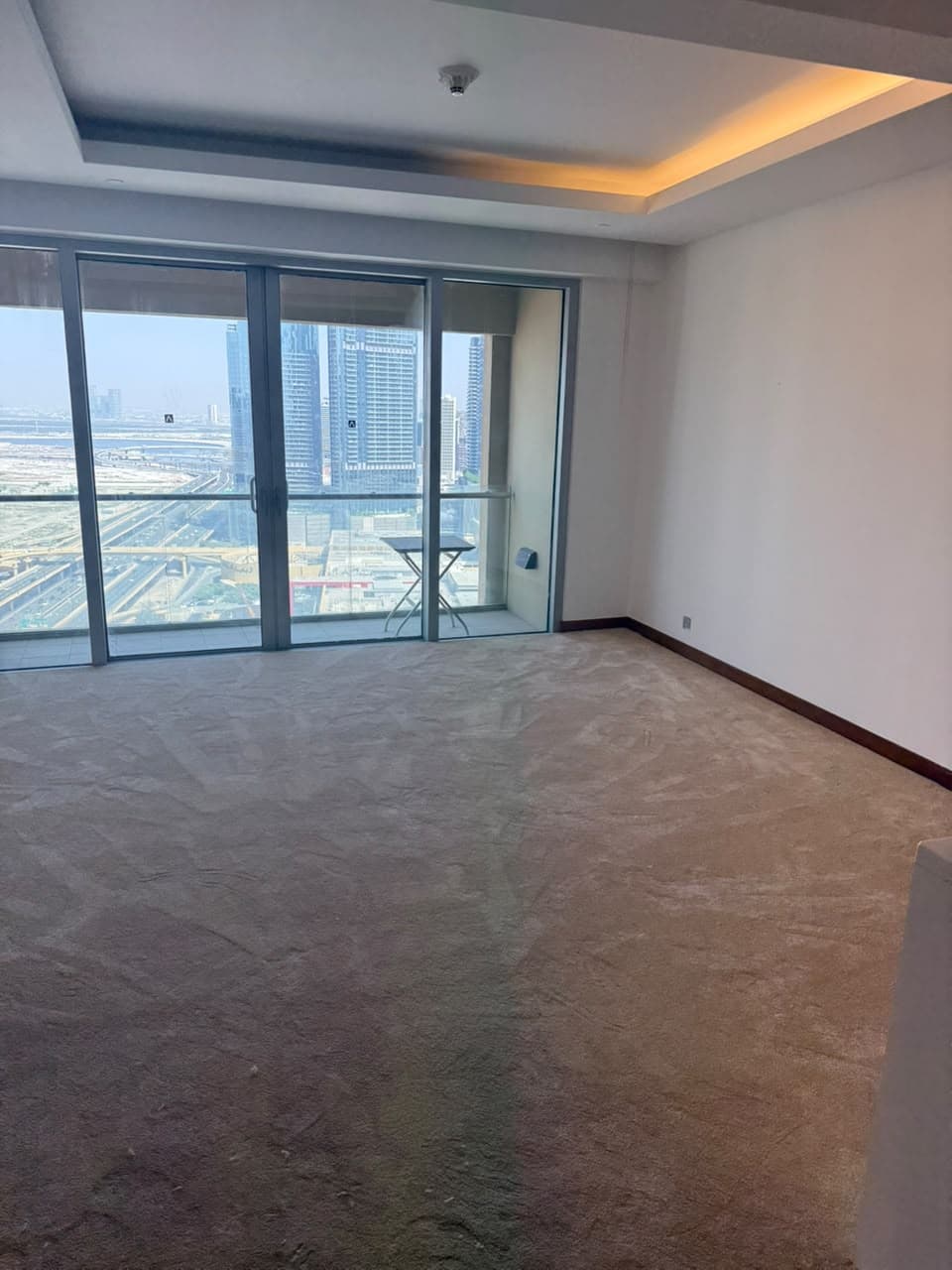 THE RUGS installation team working at Kempinski Dubai Mall
